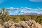 USA, New Mexico, Rio Grande del Norte National Monument. Forest and mountain landscape. Art Print